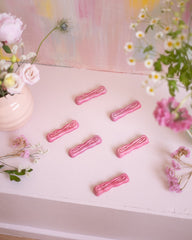 6 anciens porte-couteaux en céramique rose