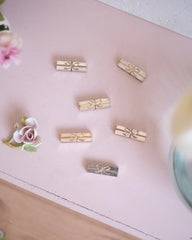 6 anciens porte-couteaux en métal argenté et doré