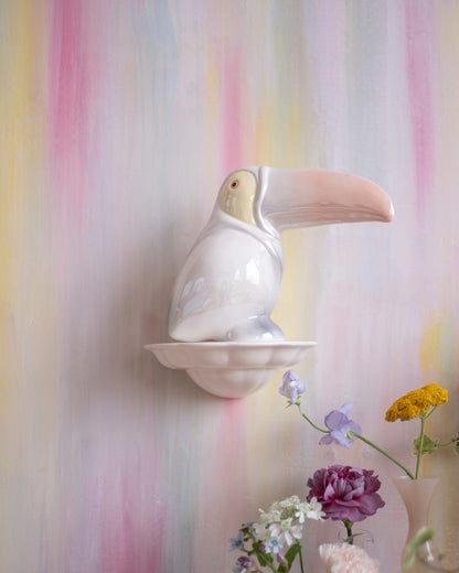 Ancien toucan en céramique irisée
